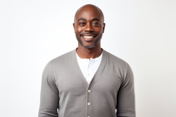 Wall Mural - Portrait of a happy african american man smiling at camera over white background