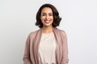 © Hanne Bauer - Portrait of a Saudi Arabian woman in her 30s in a white background wearing a chic cardigan