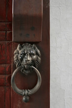 Antique Door Ring With Lion Craft Decoration On Wooden Door
