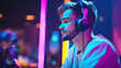 © tong2530 - joyful man gamer wear headphone competition play video game online with smartphone colorful neon light in living room at night modern house. Generative Ai