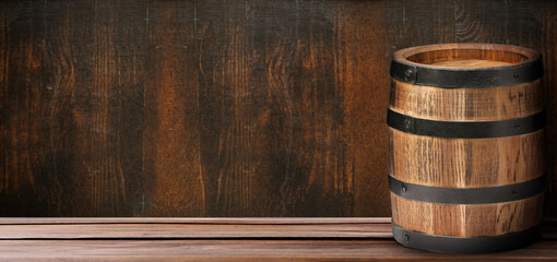 Canvas Print - Barrel on wooden background, space for text. Banner design