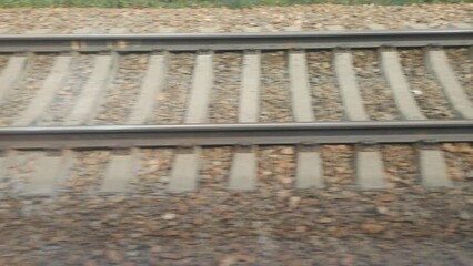 Poster - Fast-moving railway outside train window.