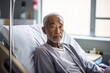 Senior asian man sitting in a hospital bed
