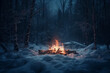 Beautiful landscape with bonfire flames burning fire red on the background of snowy winter nature forest. outdoor concept suitable for hiking and camping.