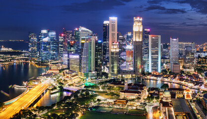 Wall Mural - Singapore business district and city at twilight, Asia - panorama