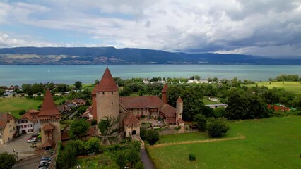 Wall Mural - Switzerland scenic places. Estavayer-le-lac - charming traditional village, lake  Neuchatel. aerial drone video of medieval castle. Canton Fribourg