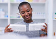 © LuneVA/peopleimages.com - Pharmacy, product choice and happy black woman, customer or client reading package, box or pharmaceutical label. Hospital clinic store, supplements pills or African person smile for medicine decision