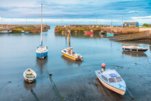 Moored Boats In The Picturesque Harbour At St Monans Village In Fife, Scotland.