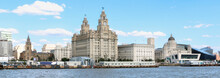 Panorama Of Iconic Liverpool Pier Head Skyline Featuring The Three Graces, The Royal Liver Building, The Cunard Building And The Port Of Liverpool Building