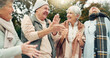 © Felix/peopleimages.com - Excited, singing and senior people in nature for camping, happiness and bonding together. Smile, dance and face portrait of elderly friends, man and women having fun with a celebration in a park