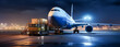 © Adrian Grosu - Large passenger aircraft being loaded in the night at airport