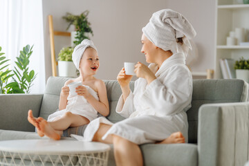 Wall Mural - mother and daughter after a bath