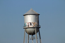 Water Tower With Grafitti