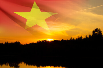 Flag of Vietnam with transparency against the sunset