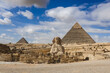 Giza Pyramids and Sphinx on a rare cloudy day - Cairo, Egypt	