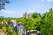 View of Hruba Skala Castle surrounded by sandstone rocks on sunny summer day, Bohemian Paradise, Czech: Cesky raj, Czech Republic