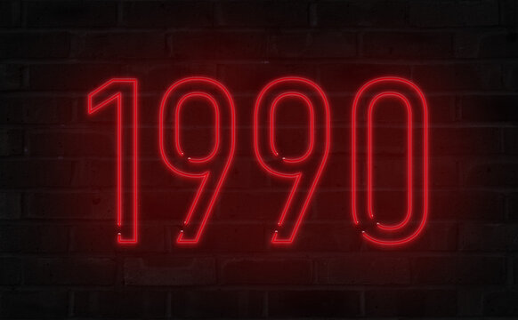 Red 1990 neon sign on brick wall