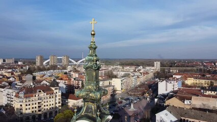 Poster - Aerial of a clock tower of a church in Linz city, Austria with the cityscape in the background