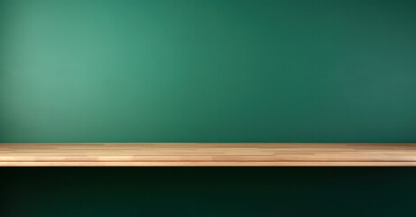 Poster - Brown wooden shelf with green wall background and has a reflection of spotlight. High quality photo