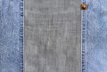 Sticker - Horizontal background with blue denim borders with a seam, leather label and light grey cotton texture. Decorative backdrop with light blue and gray color denim jeans fabric