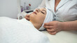© RomanR - young woman lies on a bed in a spa center