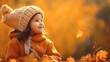 紅葉と子供、秋のオレンジ色の自然を楽しむ女の子