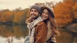 © Suleyman - Lovely couple having fun together in nature. Fashion couple enjoying autumn. Boyfriend carrying his girlfriend on piggyback.Young couple walking near lake in autumn