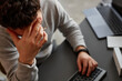 © Westend61 - Stressed IT professional sitting at desk