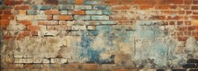 Old Wall Background With Graffiti-marked, Discolored Bricks