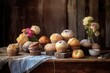 assorted muffins on a distressed wooden table with burlap