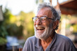 Elderly Man Laughing as He Tells Stories to His Family, love and happiness of old age,  