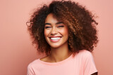 Fototapeta  - Beautiful woman with afro hair smiling on bright pink background, smiling portrait