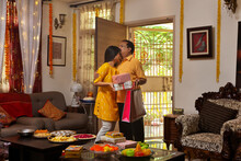 Father Is Kissing On Her Daughters Forehead As He Enters His House During The Festival Of Diwali 