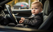 © Fox_Dsign - un bébé en costume assis au volant d'une voiture