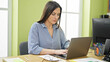 © Krakenimages.com - Young beautiful hispanic woman business worker using laptop at office