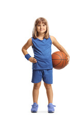 Wall Mural - Little girl in a blue jersey kit holding a basketball and smiling