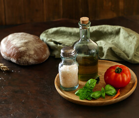 Wall Mural - olive oil tomatoes basil and bread, rustic style