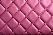 Detail eines pinkfarbenen Sofas aus Leder