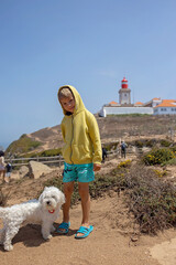 Wall Mural - Family with children, siblings, visiting the most west point of Europe, Cabo Da Roca, during family vacation summertime