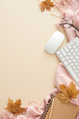 Wall Mural - Autumn-infused workspace. Top view vertical shot of pink plaid, pen, copybook, keyboard, computer mouse, eyewear, autumn leaves on pastel beige background with empty space for promo or text