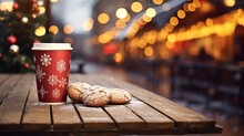 Merry Christmas And Happy Holidays, A Cup Of Hot Drink And Cookies On The Background Of The Lights Of The Christmas Market. AI Design