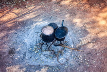 South African Porridge Made Out Of Sorghum Millet Cooking In The Outdoors Kitchen In A Three Legged Pot