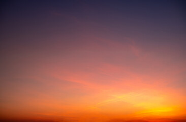 Wall Mural - beautiful , luxury soft gradient orange gold clouds and sunlight on the blue sky perfect for the bac