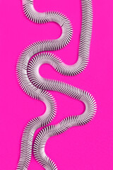 Poster - Silver necklace on pink