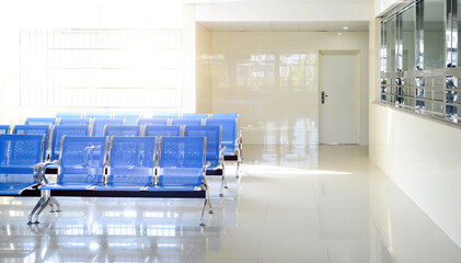 Wall Mural - Hospital waiting room with low of empty chairs