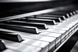 A close perspective of piano keys emphasizes their stark contrast and the harmony found within opposites