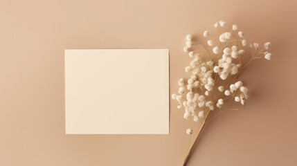 Poster - Mockup of a wedding invitation card featuring eucalyptus and gypsophila Card is blank and displayed on a beige background