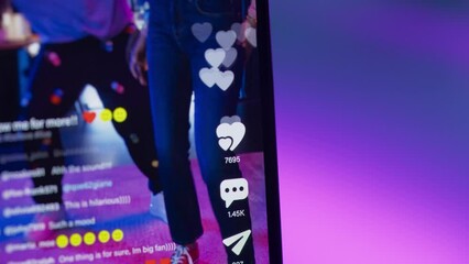Close Up on Likes Button and Counter for Female And Male Dancers Streaming a Choreography Online on Social Media Smartphone App. Internet Users Cheer, Leave Comments, and Share the Live Performance