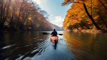 A Kayaker Floats Down The River In The Autumn Forest 1