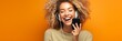 © wolfhound911 - girl with phone on orange background. .